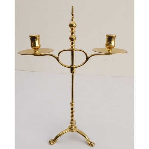 76 - A pair of stylish Arts and Crafts style, height adjustable, two-light candelabra; large circular dri... 