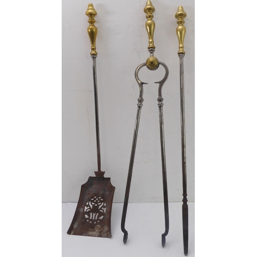 77 - A set of three 19th century steel fireirons comprising pierced shovel, tongs and poker; each with br... 