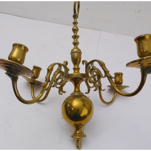 80 - A pair of ceiling-hanging four-light brass candelabra, together with a pair of brass wall appliques ... 