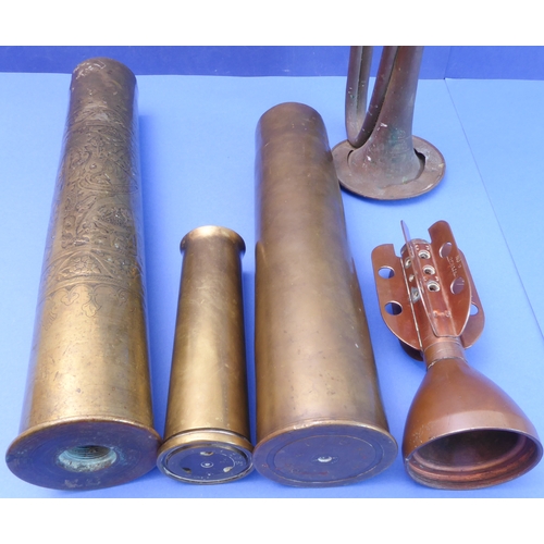 64 - An interesting selection of metalware: 

 - a large WWI Trench Art type brass shell case profusely e... 