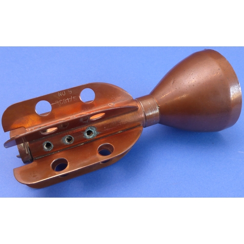 64 - An interesting selection of metalware: 

 - a large WWI Trench Art type brass shell case profusely e... 