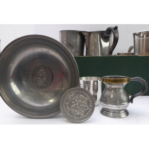 65 - An interesting selection of pewterware (mostly 20th century) with two19th century examples to includ... 