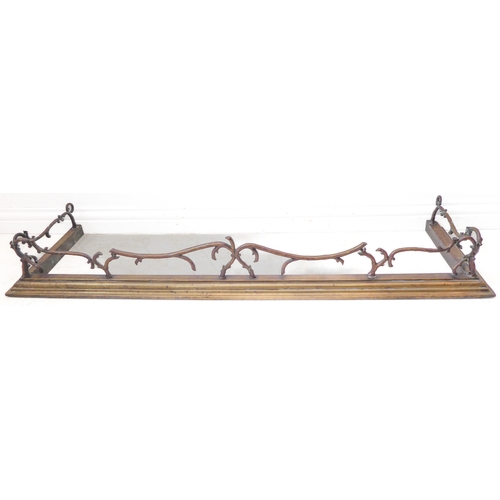 71 - An unusual  late 19th century heavy brass fire curb / fender; naturalistically modelled varying entw... 