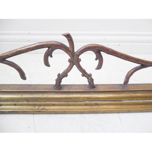 71 - An unusual  late 19th century heavy brass fire curb / fender; naturalistically modelled varying entw... 