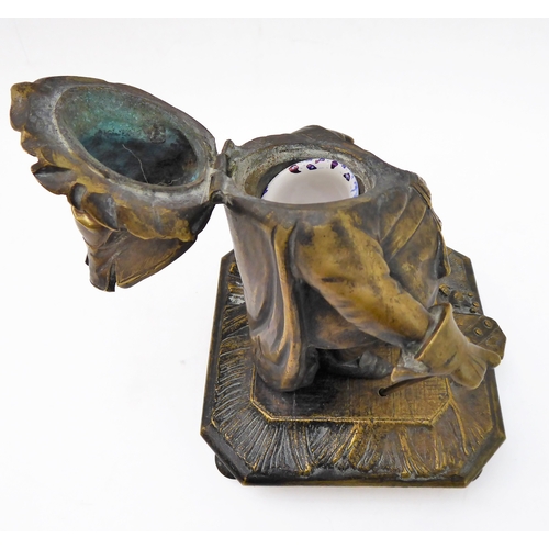78 - A rare 19th century bronze / brass inkwell modelled as Falstaff - the hinged upper section folding b... 