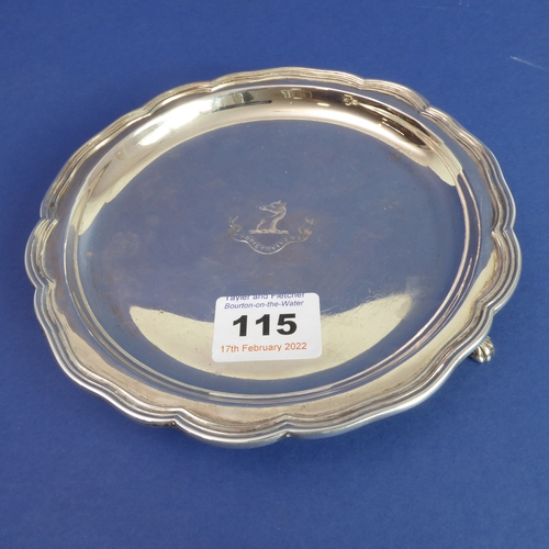 115 - An Edwardian hallmarked silver salver; raised reeded edge surrounding an engraved armorial with lati... 
