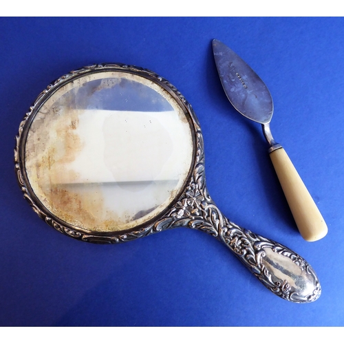 94 - An early 20th century Edwardian hallmarked silver lady's dressing table hand-held mirror (assayed Ch... 