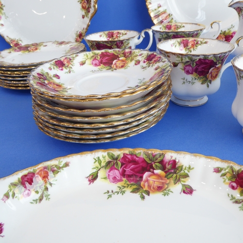 10 - A Royal Albert 'Old Country Roses' bone china tea service comprising:
 a large teapot (20 cm high);
... 