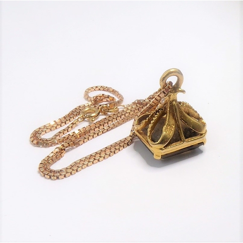 108 - A 9-carat gold stone-set fob and 9-carat gold box chain