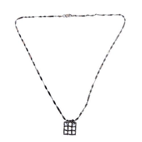 114 - A silver pendant modelled as a portcullis upon a silver neck chain, in presentation box