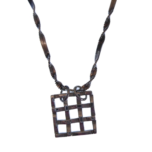 114 - A silver pendant modelled as a portcullis upon a silver neck chain, in presentation box