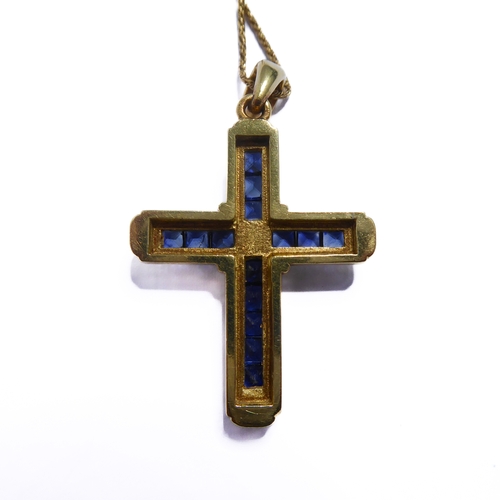 116 - A 18-carat gold, sapphire and diamond cross with an 18-carat gold chain