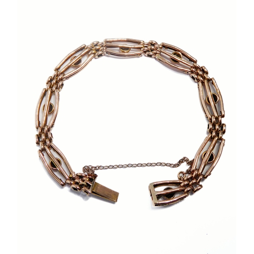 119 - A 9-carat gold gate-style bracelet with safety chain