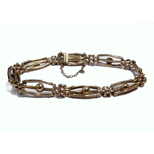 119 - A 9-carat gold gate-style bracelet with safety chain