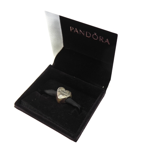 123 - Two .925 Pandora silver rings (ring sizes S) and three .925 silver charms (boxed)