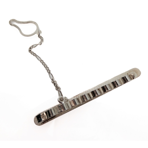 124 - A silver money-clip and chain