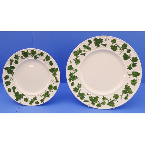 14 - A 97-piece Bordallo Pinheiro dinner service:
 10 x 26 cm plates;
 45 x 20.5 cm plates;
 15 x 20.7 cm... 