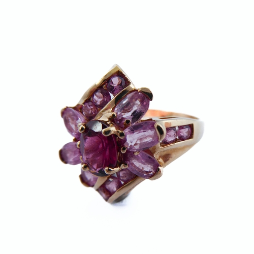 140 - A 9-carat gold pink stone cluster ring, ring size P