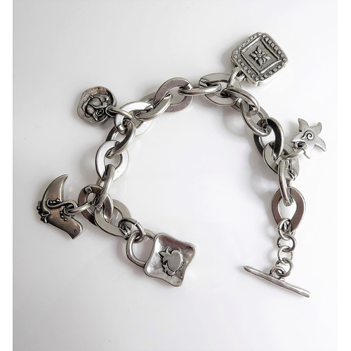 148 - An unusual bracelet set with various charms and signed 'Danon'