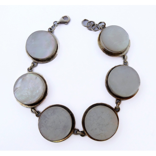 153 - A silver and mother of pearl link bracelet