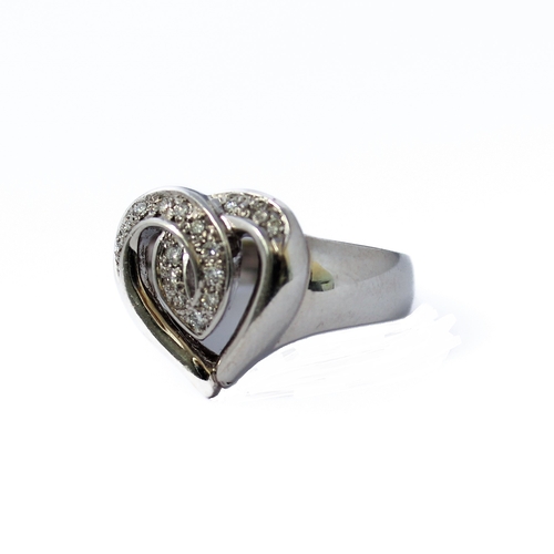 157 - An 18-carat white gold 'heart' ring set with diamonds, ring size N/O