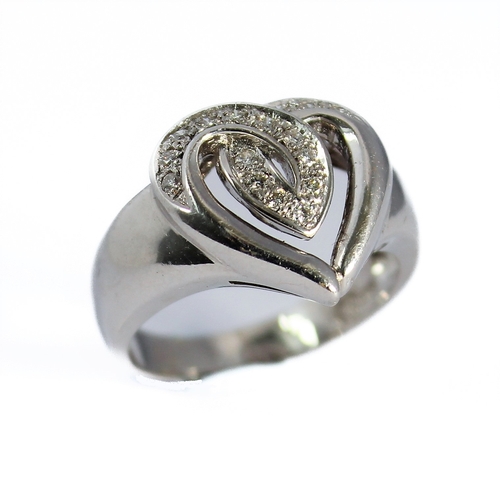 157 - An 18-carat white gold 'heart' ring set with diamonds, ring size N/O