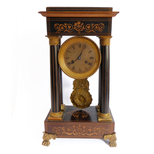 161 - A mid-19th century French portico clock: partridge wood marquetry, boxwood-strung and ormolu-mounted... 