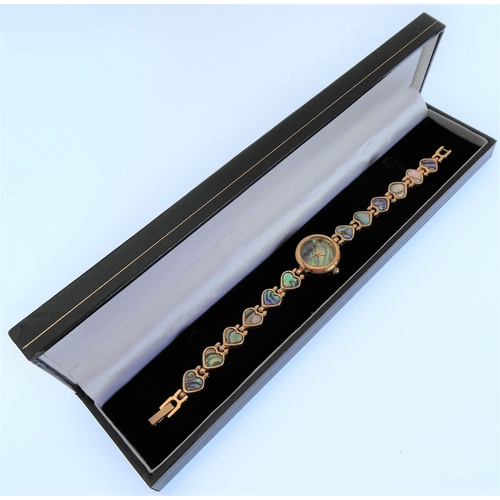 167 - A lady's gold-plated and mother of pearl mounted dress watch: the mother of pearl dial with Arabic n... 