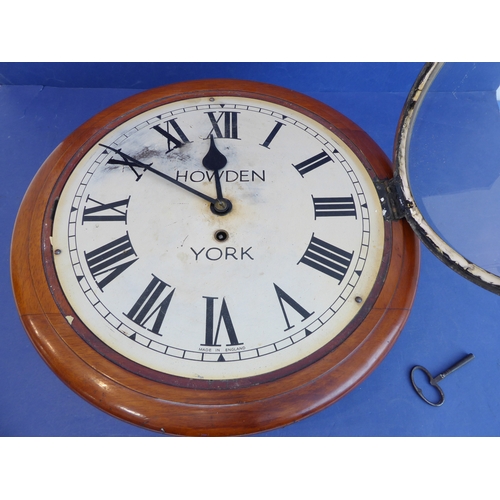 168 - An early 20th century circular mahogany cased school / stationmaster's style clock: the cream dial (... 