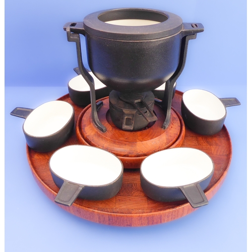 195 - A selection to include:
 a six-person Digsmed fondue set with two-tier parquetry 'Lazy Susan';
 a se... 