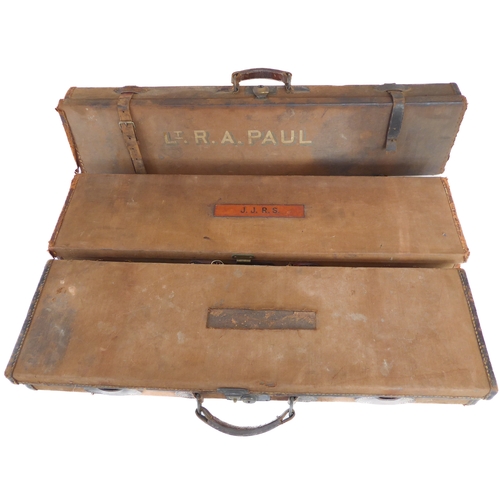 204 - Three canvas and leather gun cases: 31