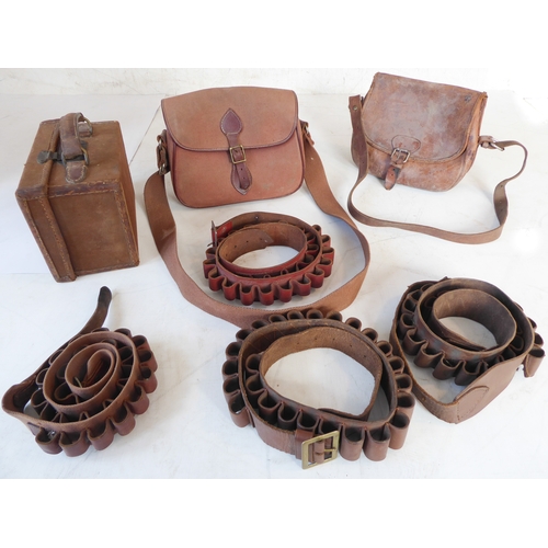 207 - A small cartridge magazine, two cartridge bags (one all-leather) and four cartridge belts