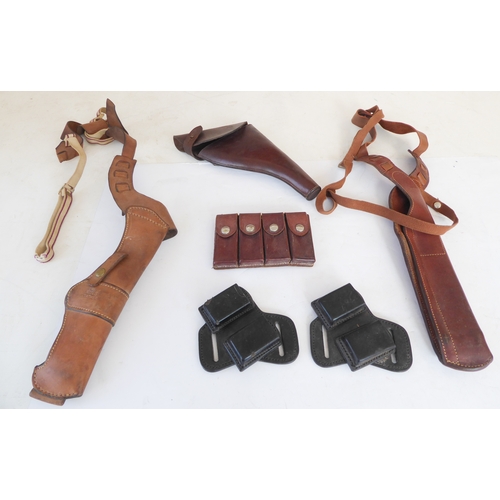 209 - Three leather pistol holsters and three leather magazine holders:
 a Bianchi 'Phantom' shoulder hols... 