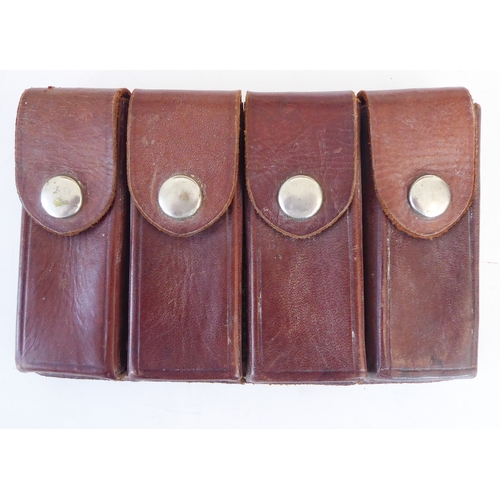 209 - Three leather pistol holsters and three leather magazine holders:
 a Bianchi 'Phantom' shoulder hols... 