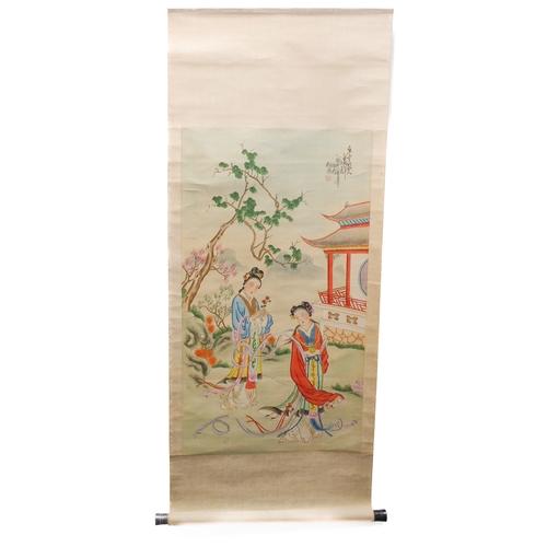 228 - A Chinese scroll watercolour depicting two courtesans within a garden, signed and with circular red ... 