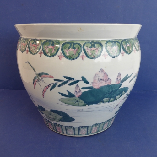 3 - A large Chinese porcelain carp bowl/planter of ovoid form: the lip with key fret design above a band... 