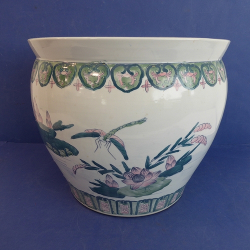 3 - A large Chinese porcelain carp bowl/planter of ovoid form: the lip with key fret design above a band... 