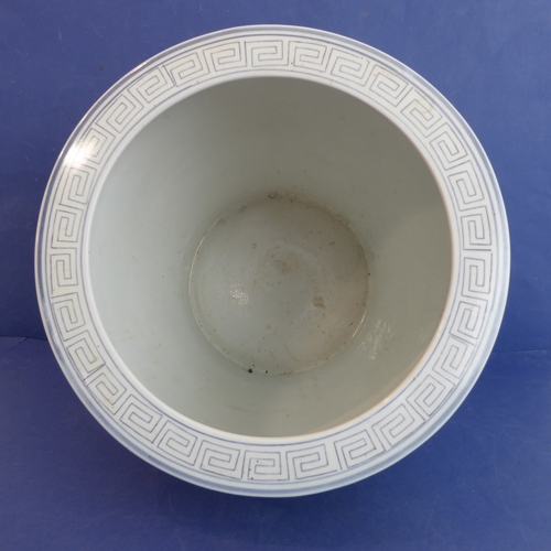 3 - A large Chinese porcelain carp bowl/planter of ovoid form: the lip with key fret design above a band... 