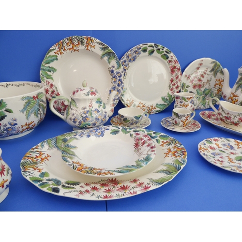 33 - An 81-piece Gien 'Tamarin' dinner service:
 7 x 31.5 cm shallow bowls;
 7 x 29 cm plates;
 10 x 23 c... 