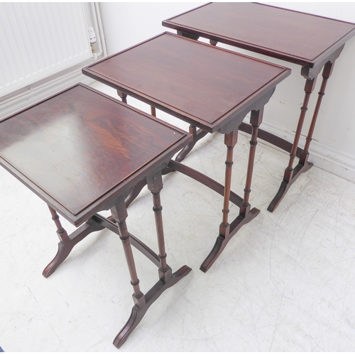 344 - A nest of three early 19th century style (later) mahogany quartetto tables (the largest 51cm wide x ... 