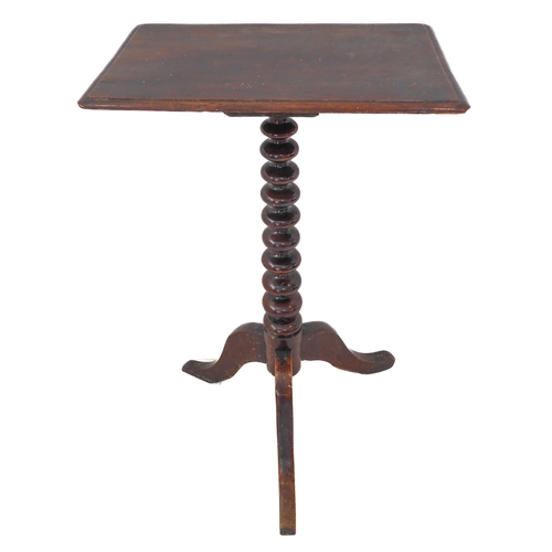 350 - A 19th century rectangular-topped mahogany occasional table: bobbin turned stem on tripod base (43.5... 