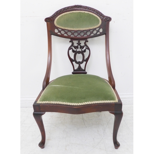 352 - An early 20th century American-style child's stained-wood upholstered rocking chair (42cm wide x 69c... 