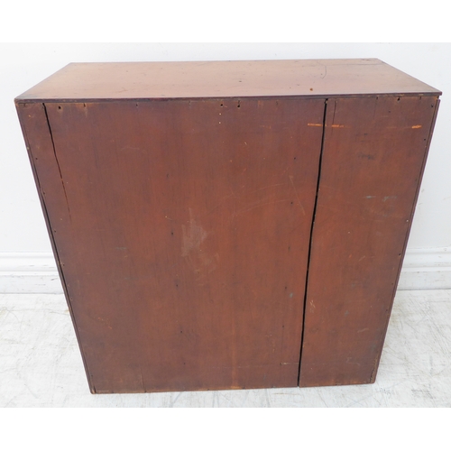 355 - A 19th century mahogany cabinet with single panelled door opening to reveal ten pigeonholes (51cm wi... 