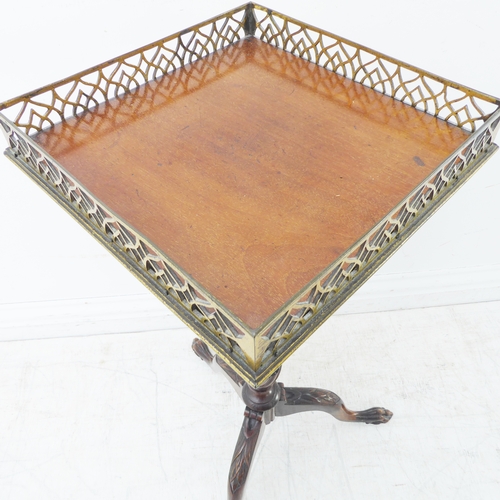 362 - An early 20th century mahogany tripod table: square top with pierced gilt-metal gallery, slender tur... 