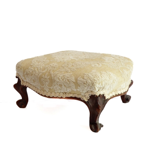 373 - A small mid-19th century walnut stool in mid-18th century Louis XV style: later upholstered top abov... 