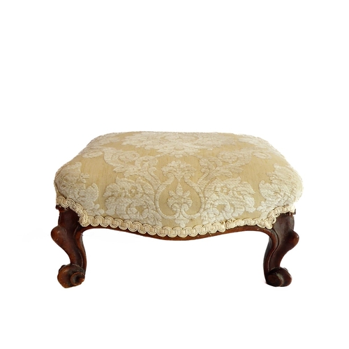 373 - A small mid-19th century walnut stool in mid-18th century Louis XV style: later upholstered top abov... 