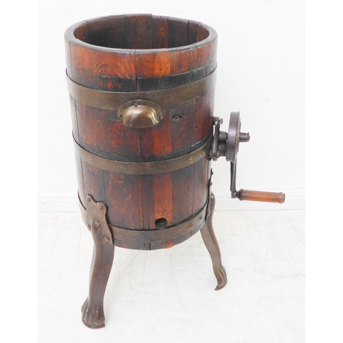 375 - An early 20th century coopered oak and iron-mounted butter churn (74cm high)