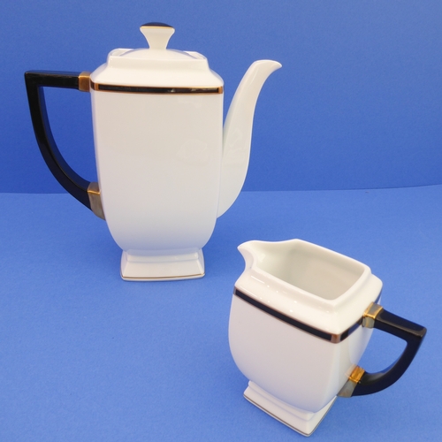 38 - A J.L. Coquet (Limoges) Prélude 28-piece tea and coffee service:
 teapot and coffee pot;
 2 x milk j... 