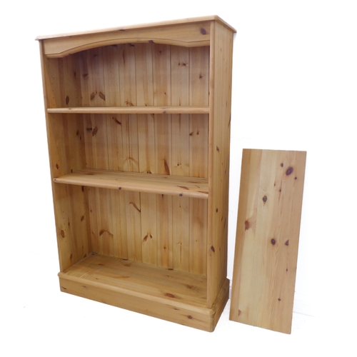 394 - A modern open pine bookcase on plinth base (83cm wide x 28.5cm deep x 125.5cm high)