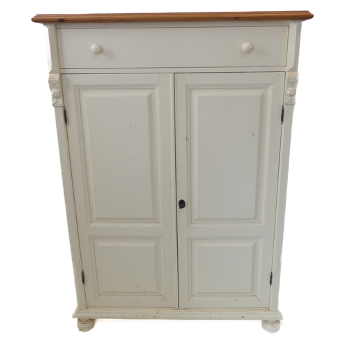 400 - A shabby-chic-style cupboard: natural pine top above a painted base with full-width drawer and two v... 